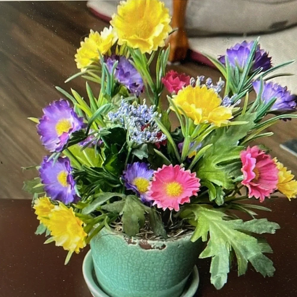 Colorful Floral Arrangement in Green ceramic Pot
